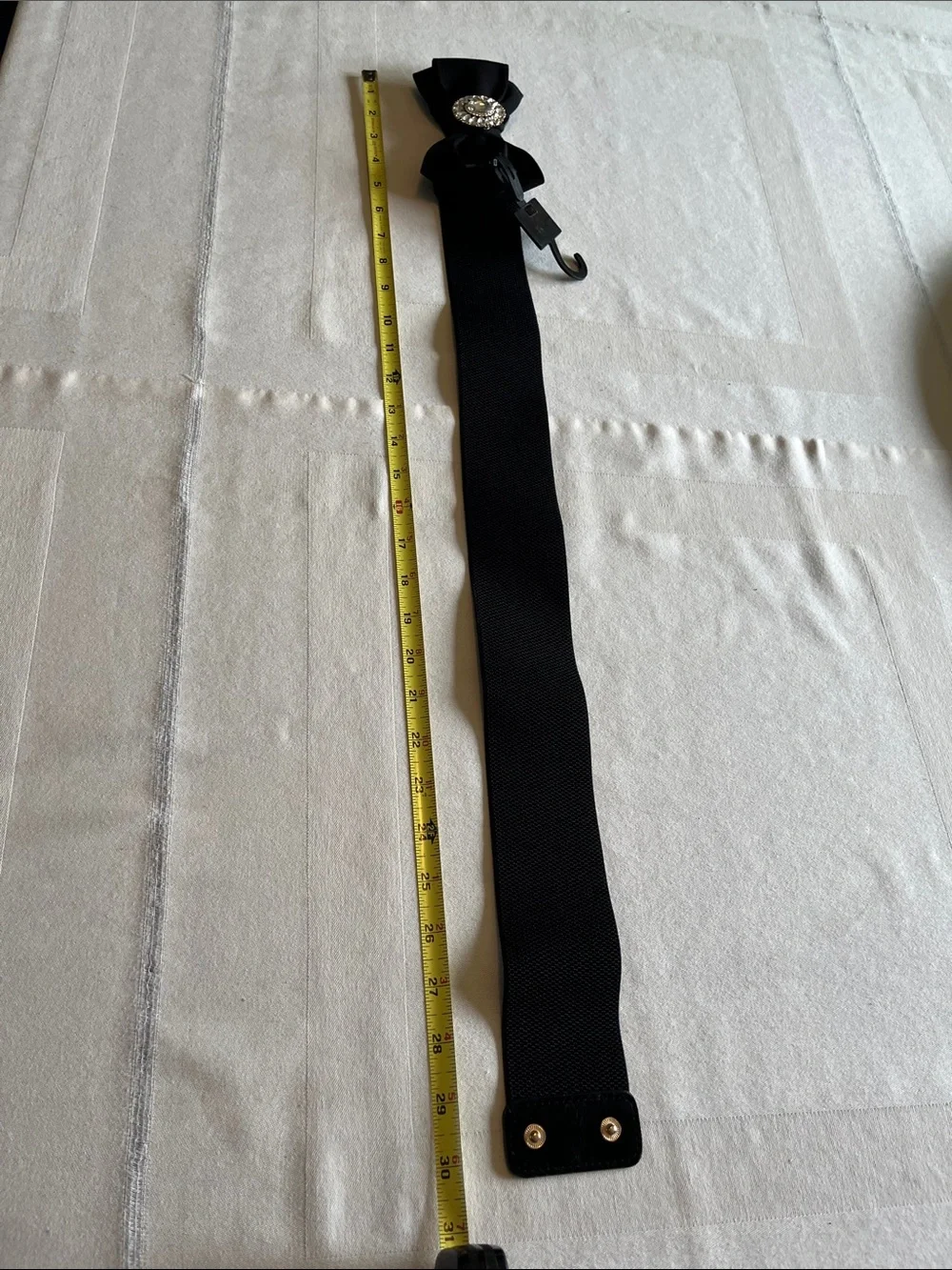 NWT nOir Jewelry Black Bow Elastic Waist Belt with Crystal Medallion Size M/L
